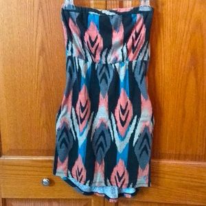 Volcano logical sundress with side pockets. Strapless with elastic top.